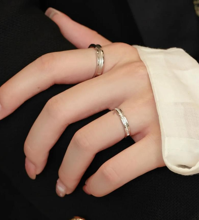 couple ring set - Sterling Silver and Moissanite worn on fingers in stylish display